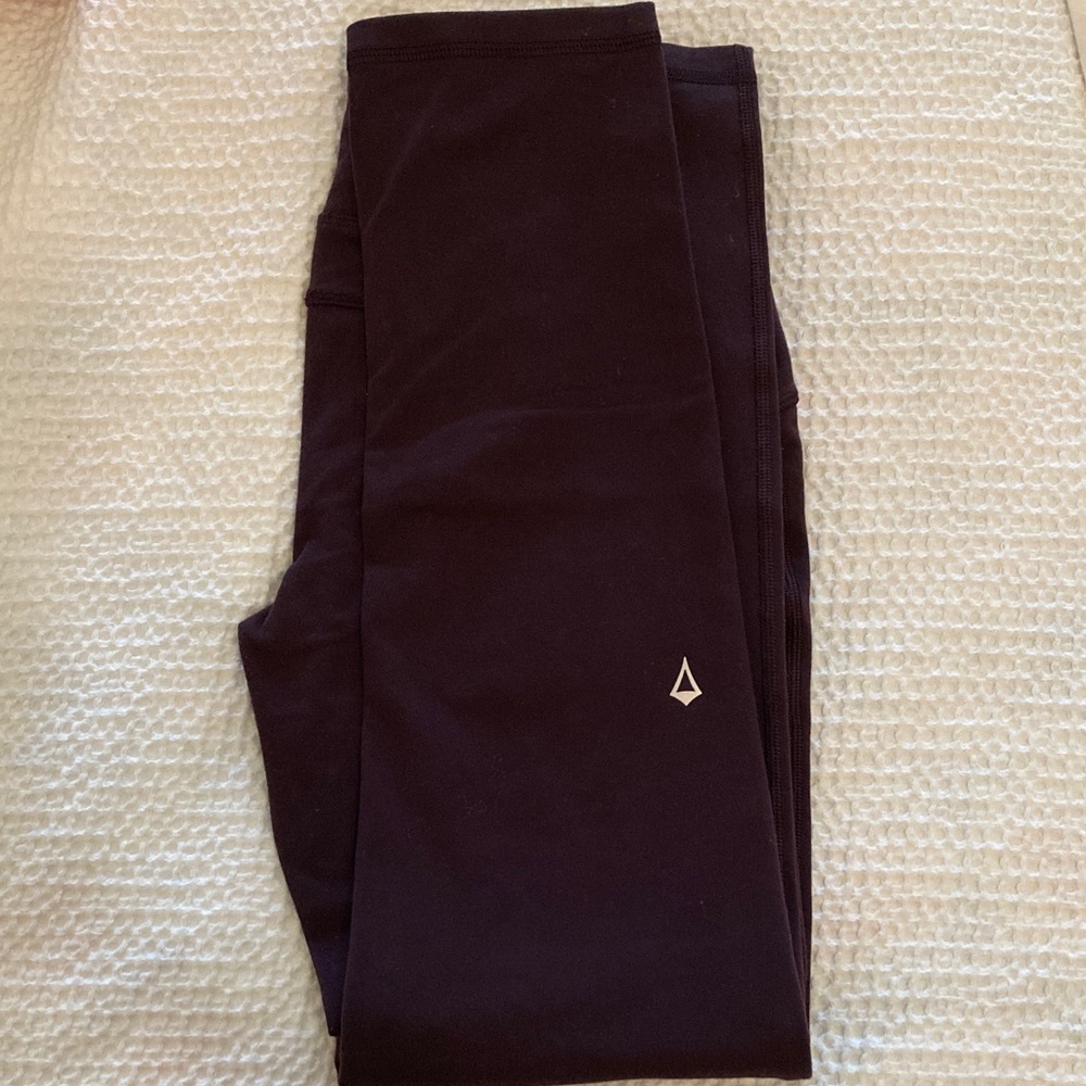 Dark Purple Iviva leggings. Lululemon brand for girls.